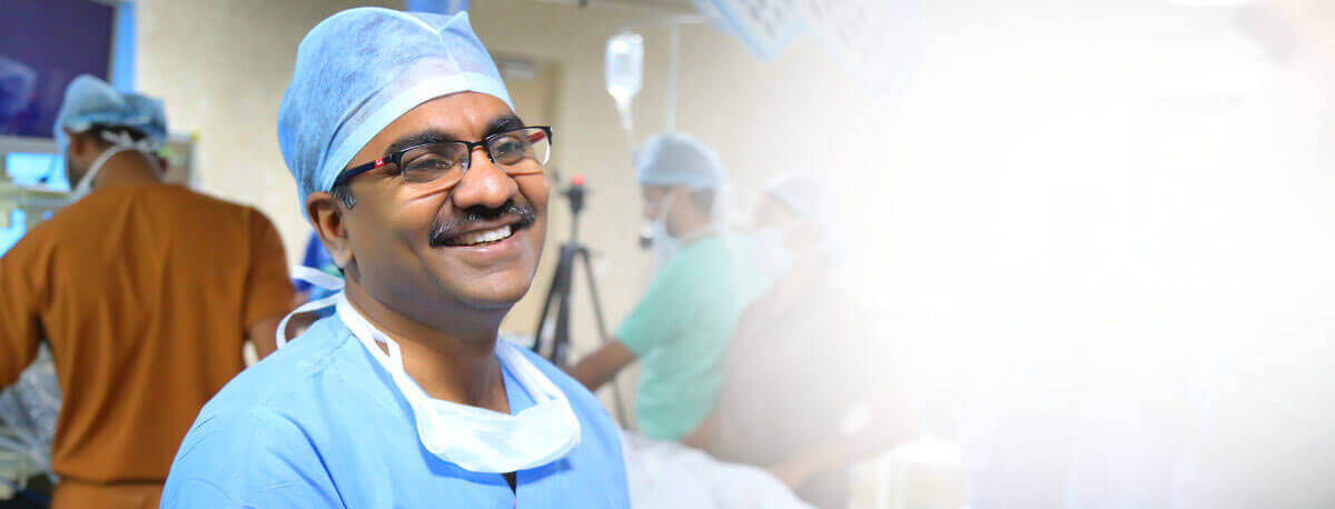 A picture of the best gastroenterology doctor in Hyderabad in his scrubs