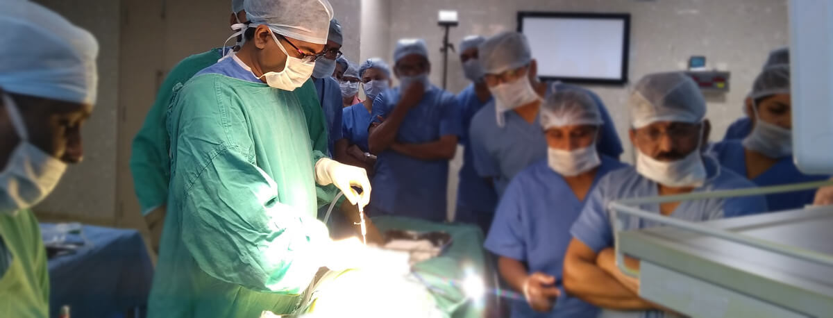 A picture of the Best Gastroenterologist specialist in Hyderabad performing surgery with his team